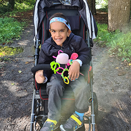 Aarav in his Swifty pushchair