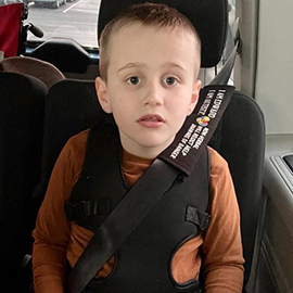 Edward in his car harness
