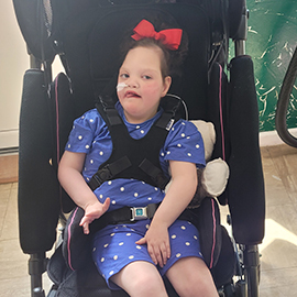 Essie in her snappi pushchair