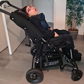 Sufian in his pushchair