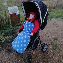 William in his swifty pushchair