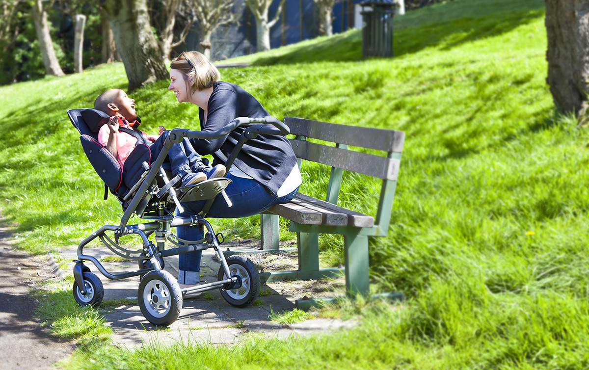Family with Snappi Swirl Pushchair